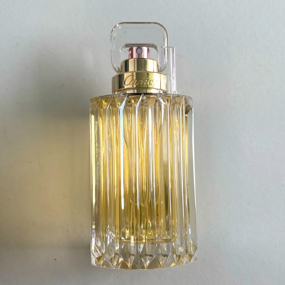 Cartier Other - Cartier Carat edp 3.3 oz full bottle